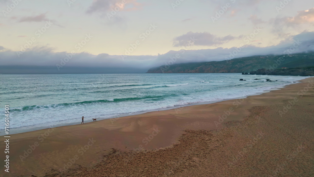 Cloudy sky sea dusk picturesque foamy waves drone view. Coastline landscape
