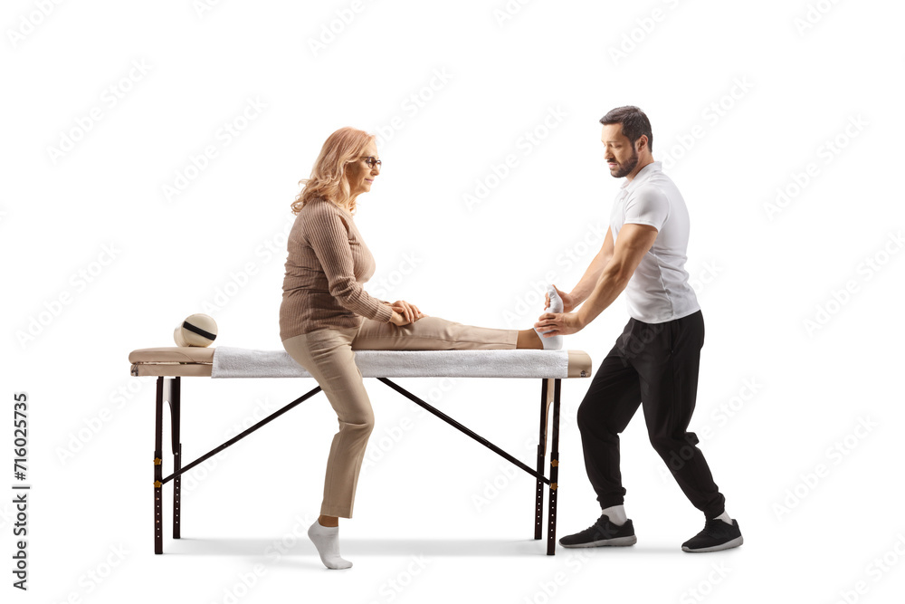 Fototapeta premium Therapist giving a foot massage to a woman
