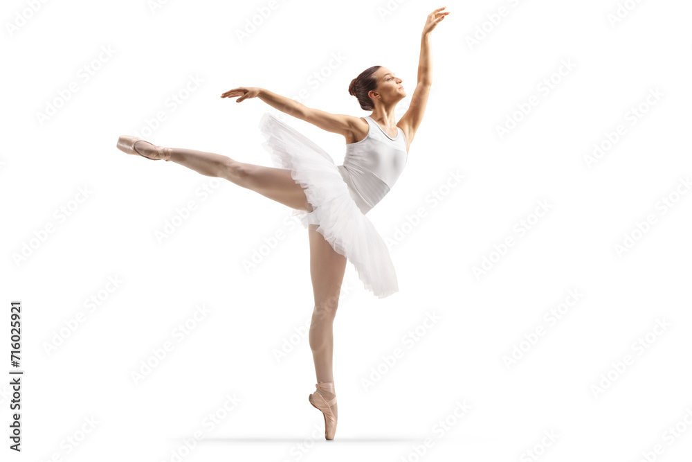 Full length shot of a ballerina dancing with one leg up