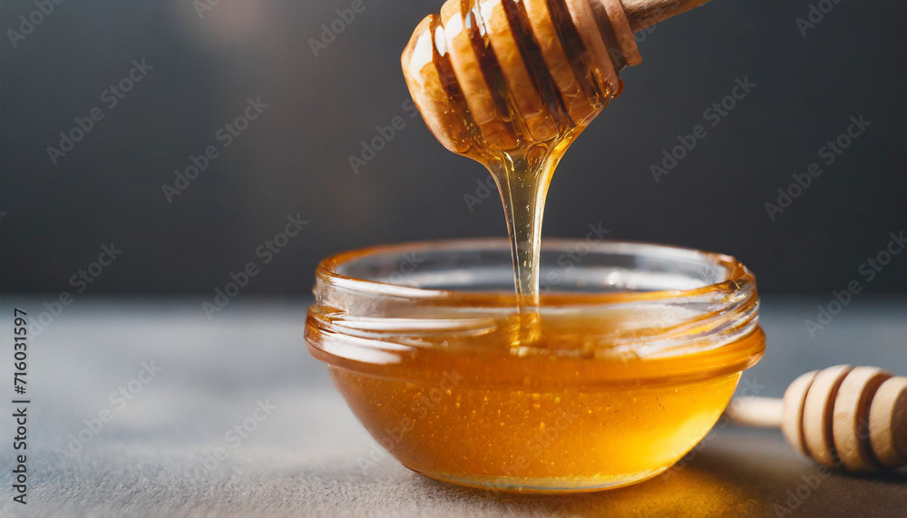 Golden honey drips from a dipper, symbolizing health and sweetness, a tempting visual of natural goodness Golden honey drips from a dipper, symbolizing health and sweetness, a tempting visual of natural goodness