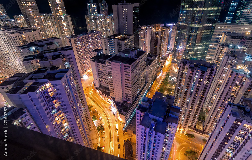 Aerial Rooftop View of Modern Contemporary Hong Kong Skyline at Night in Tai Koo, Hong Kong