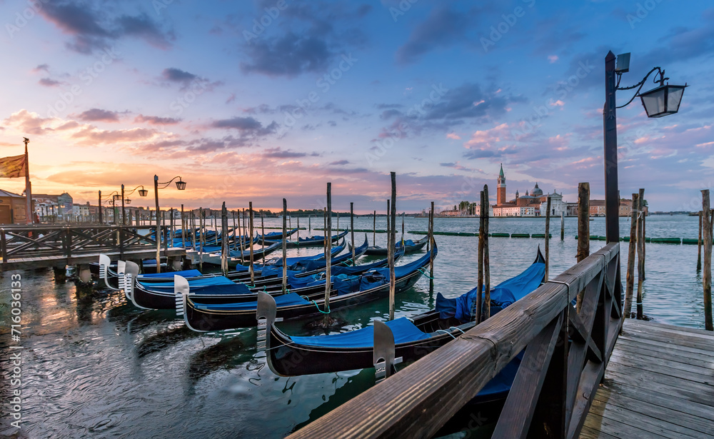 Wanderlust View of Venetian Scene with Gondolas at Morning Sunrise Dawn in Venice, Italy