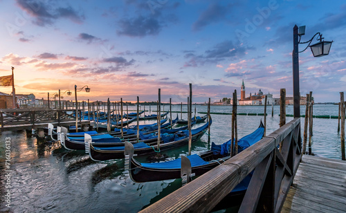 Wanderlust View of Venetian Scene with Gondolas at Morning Sunrise Dawn in Venice  Italy