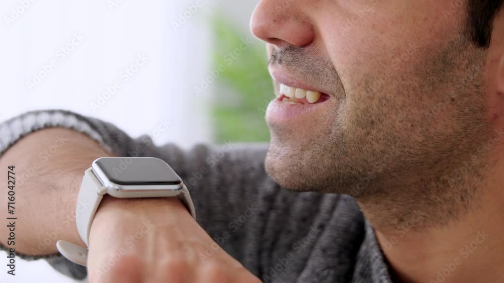 Closeup of hispanic man talking on smart watch. Closeup of hispanic man talking on smart watch.