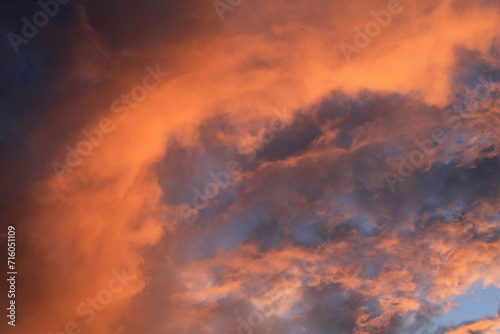 Clouds and blue sky. Evening sky, sunset with red clouds