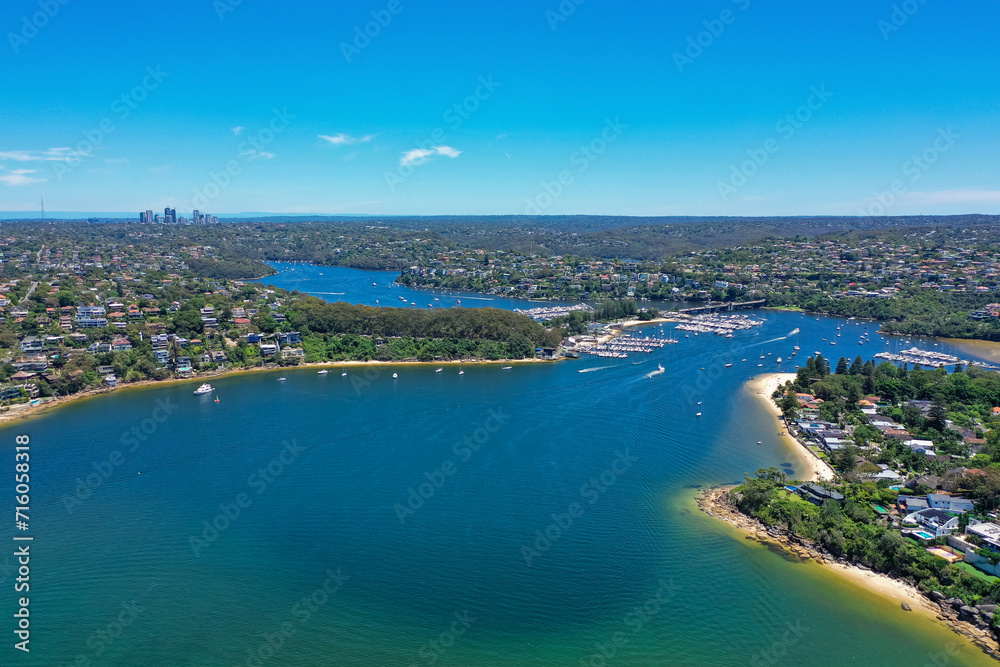 High angle aerial drone view of Spit Bridge, Clontarf Beach and Sandy Bay in the suburb of Clontarf, Sydney, New South Wales, Australia. Northern Beaches area of Sydney and Chatswood in background. High angle aerial drone view of Spit Bridge, Clontarf Beach and Sandy Bay in the suburb of Clontarf, Sydney, New South Wales, Australia. Northern Beaches area of Sydney and Chatswood in background.