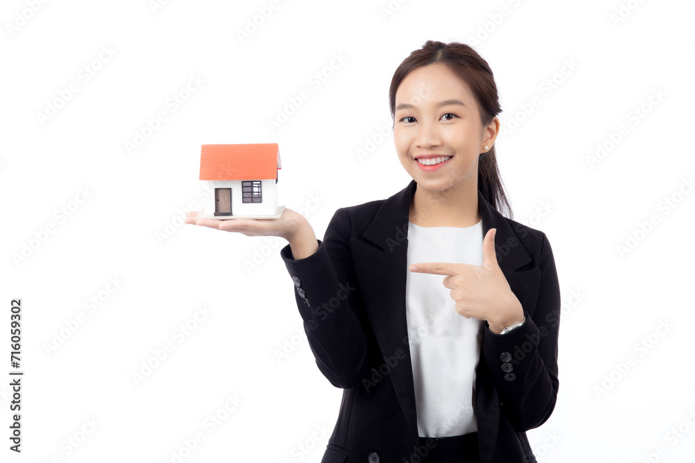 Portrait young asian businesswoman holding house for mortgage isolated white background, agent insurance business woman holding home for investment and presenting, female show home with excited. Portrait young asian businesswoman holding house for mortgage isolated white background, agent insurance business woman holding home for investment and presenting, female show home with excited.
