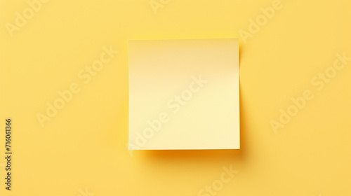 Yellow sticky note isolated on yellow background