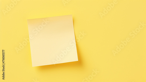 Yellow sticky note isolated on yellow background
