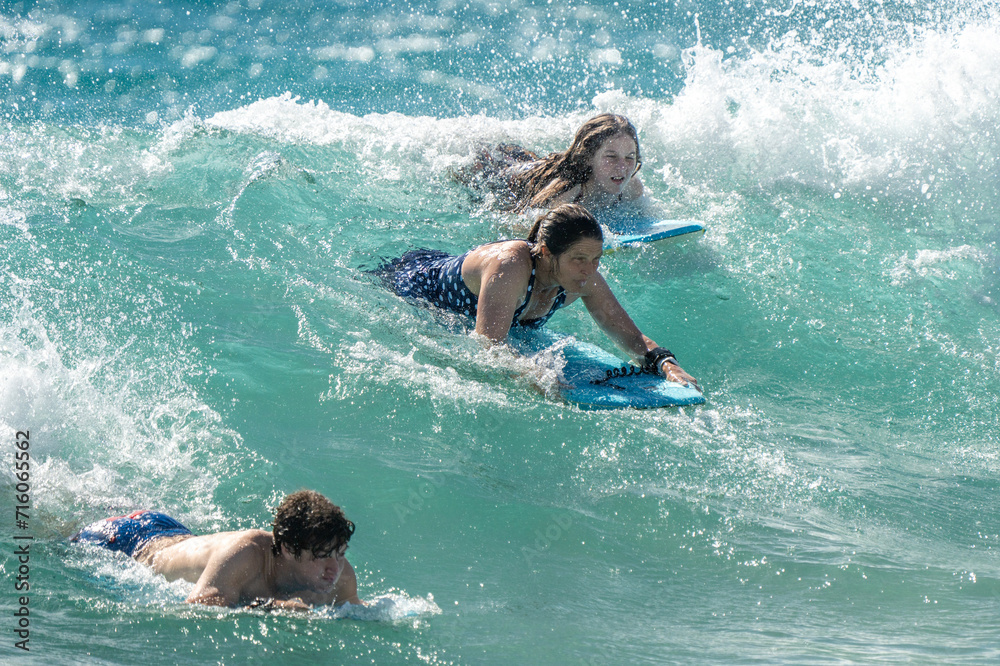 surfing on the beach in hawaii 