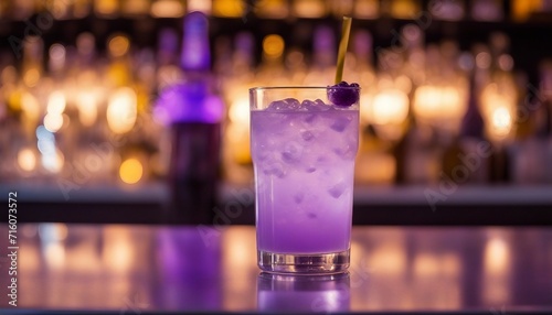  Iced Lavender Lemonade, a tall, frosted glass filled with sparkling lavender lemonade, soft purple  photo