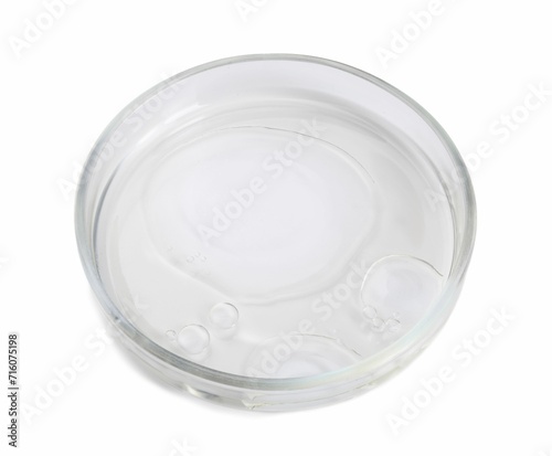 Petri dish with liquid sample isolated on white