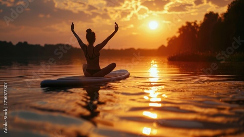 A fun and unconventional way to challenge your yoga practice – on a paddleboard. © Justlight