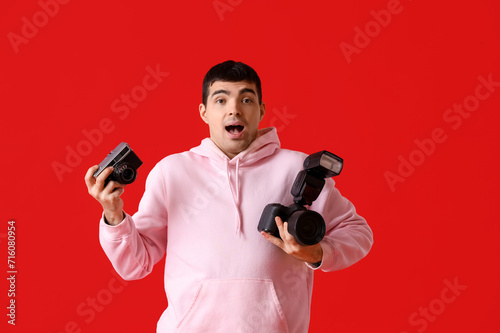 Surprised male photographer...