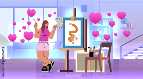 disabled woman artist in love with replaced robotic leg and arm girl drawing on canvas people with disabilities celebrating valentines day