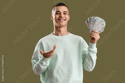 Young man with dollar bankn...