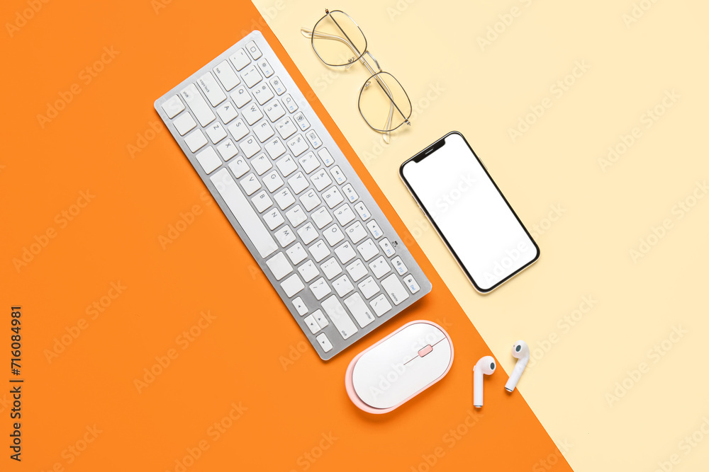 Composition with modern gadgets and eyeglasses on color background Composition with modern gadgets and eyeglasses on color background
