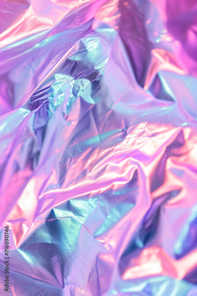 Vertical Close-up of ethereal pastel neon pink, purple, lavender, mint holographic metallic foil background.
