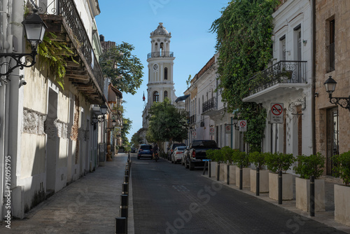 Small street with old crumbling buildings of Spanish conquistador times at Zona Colonial historical Center in Santo Domingo, Dominican Republic.