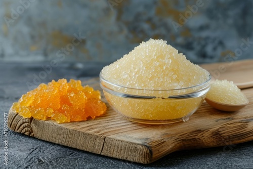 Gelatin agar agar or pectin powder on a cutting board also gelatin granules serve as gelling agent