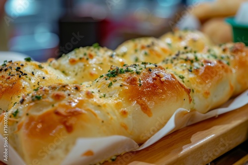 Korean Cheese Bread Yugjjog Maneulppang is a popular street food in Korea made with bread cream cheese garlic oregano and honey photo