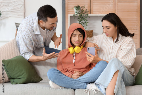 Teenage boy and his parents...