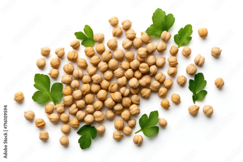 Top view of white background with organic chickpeas and green leaves Top view of white background with organic chickpeas and green leaves