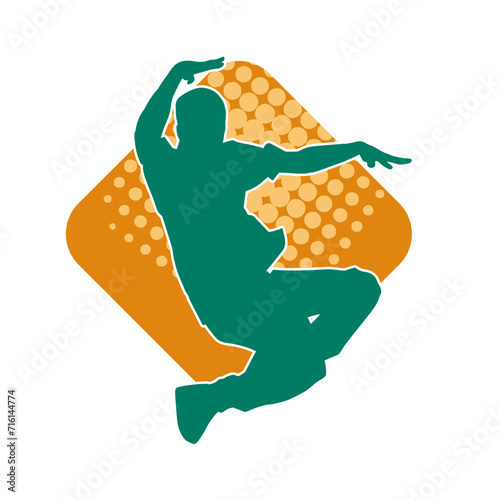Silhouette of a man in dancing pose. Silhouette of a male dancer in performing pose.
