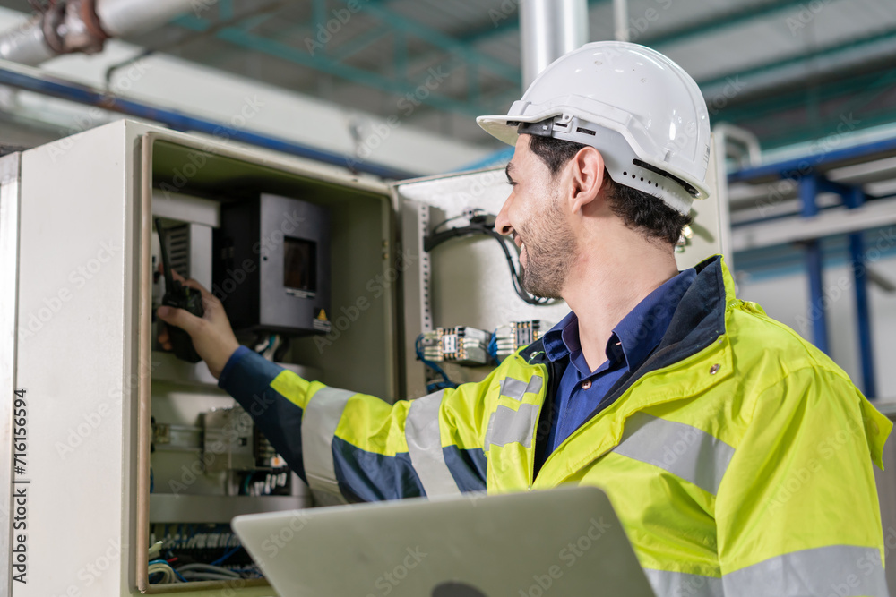 Mechanic or maintenance or electrical engineer checking main electrical