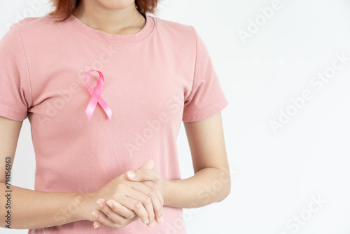 Wallpaper Mural Woman hold pink ribbon breast cancer awareness. Female health check consciousness. international Women Day and World Cancer Day. sign cancer, Symbolic, health care, support patients, timely diagnosis. Torontodigital.ca