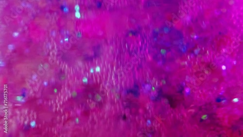 Color foam texture. Gel bubbles. Paint water. Defocused pink blue purple glitter soap fizz fluid ink floating art abstract background. photo