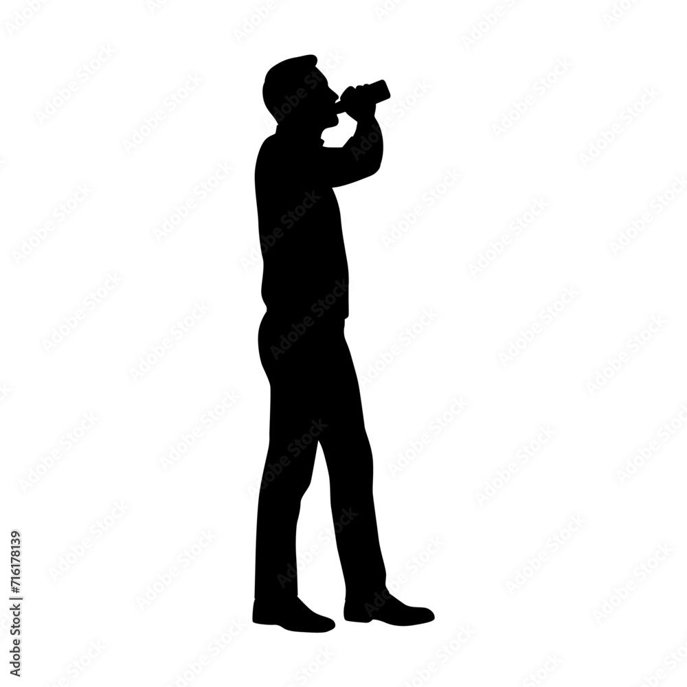 Drunk man in holding bottle and drinking beer while standing isolated