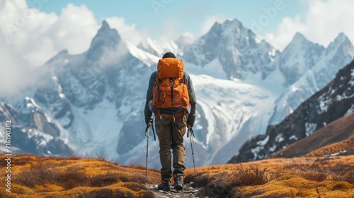 Adventurous man enjoying mountain hiking solo traveling outdoor active vacations traveler backpackin.