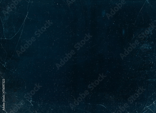 Cracked glass. Distressed overlay. White grain particles noise dust scratches broken used texture dark blue illustration abstract background.