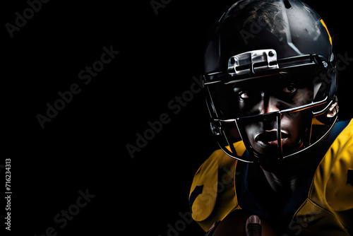 Intense American Football Player in Helmet on Dark Background