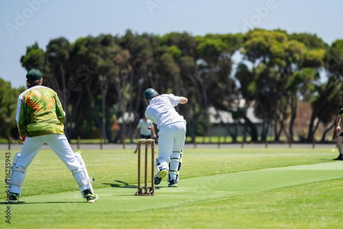 amateur game of local cricket match, cricket bat and bowl in summer