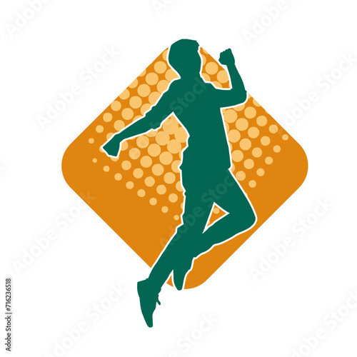 Silhouette of a slim man dancing pose. Silhouette of a male dancer in action pose.