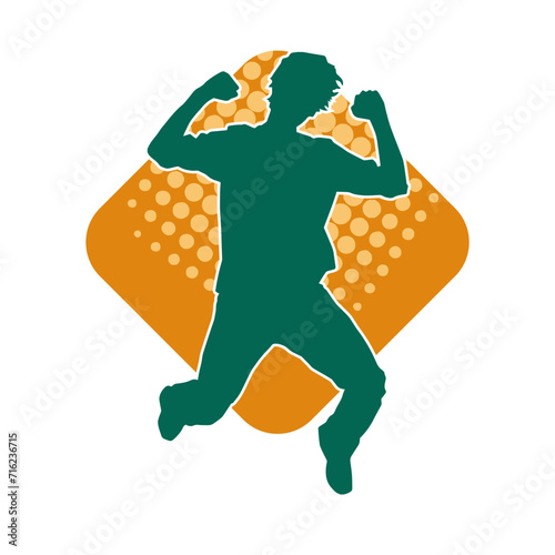 Silhouette of a slim man dancing pose. Silhouette of a male dancer in action pose.