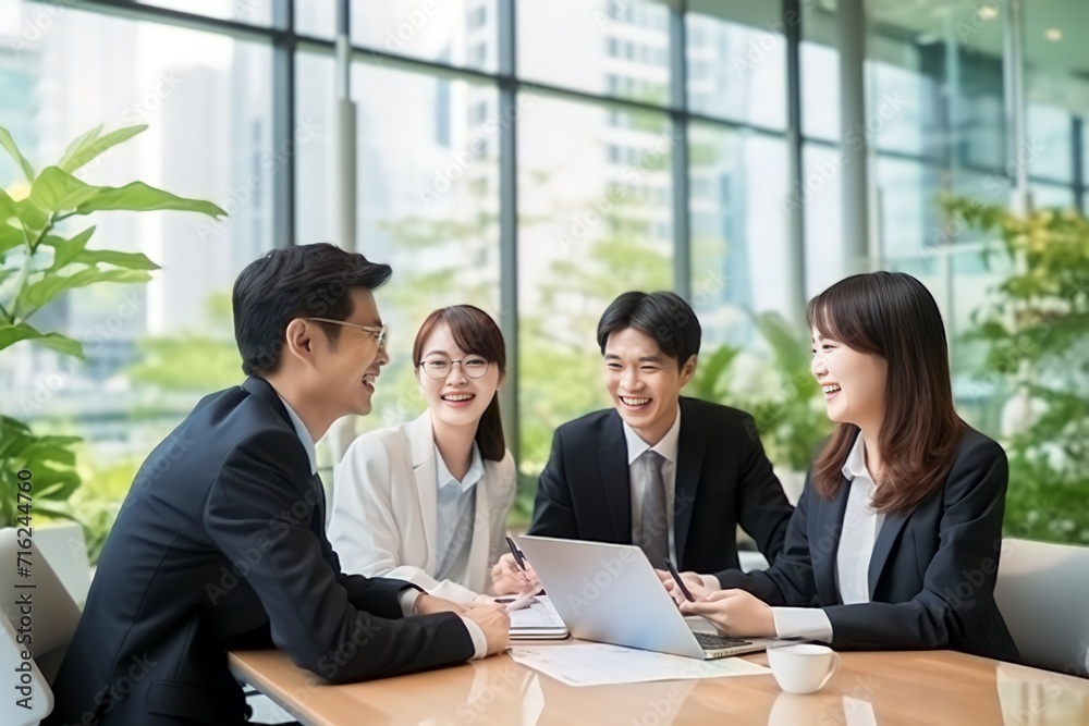 Group of Chinese people working at the office Group of Chinese people working at the office