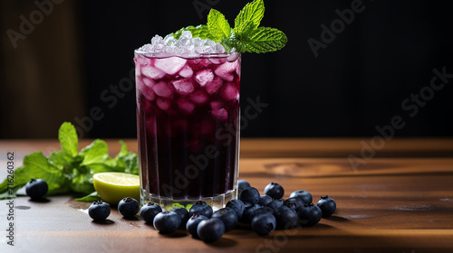 blueberry mint julep muddled blueberries and mint leaves on wooden table