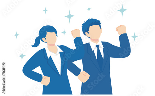 拳を握る紺色スーツの男女