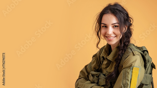 Brunette woman in Paramilitary Forces uniform isolated on pastel background