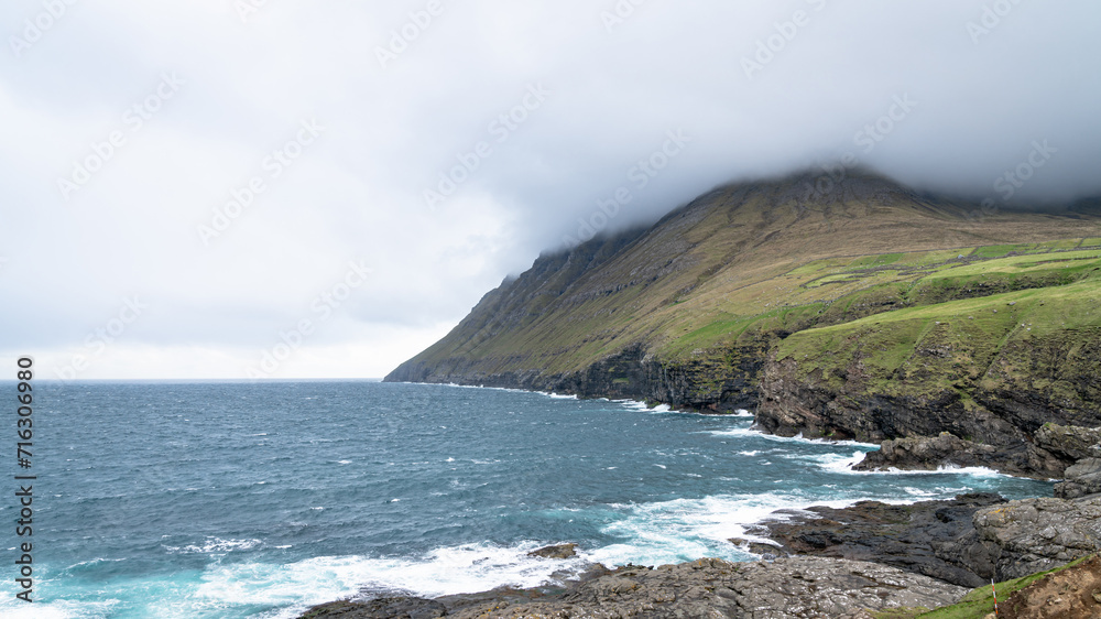 Dramatic landscape scenery on Faroe Islands. The nature of the Faroe Islands in the north Atlantic is full of beautiful landscape.