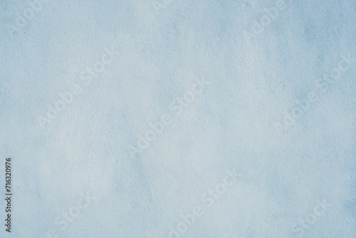 Light blue stucco texture background for backgrounds and wallpaper. photo