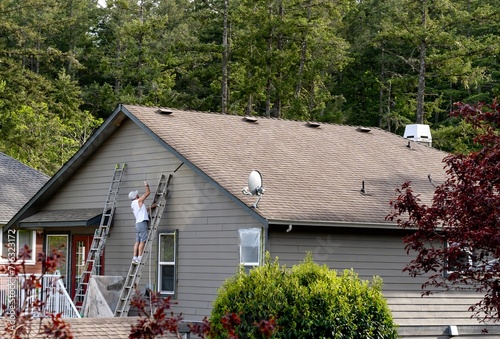 House painter work on exterior 