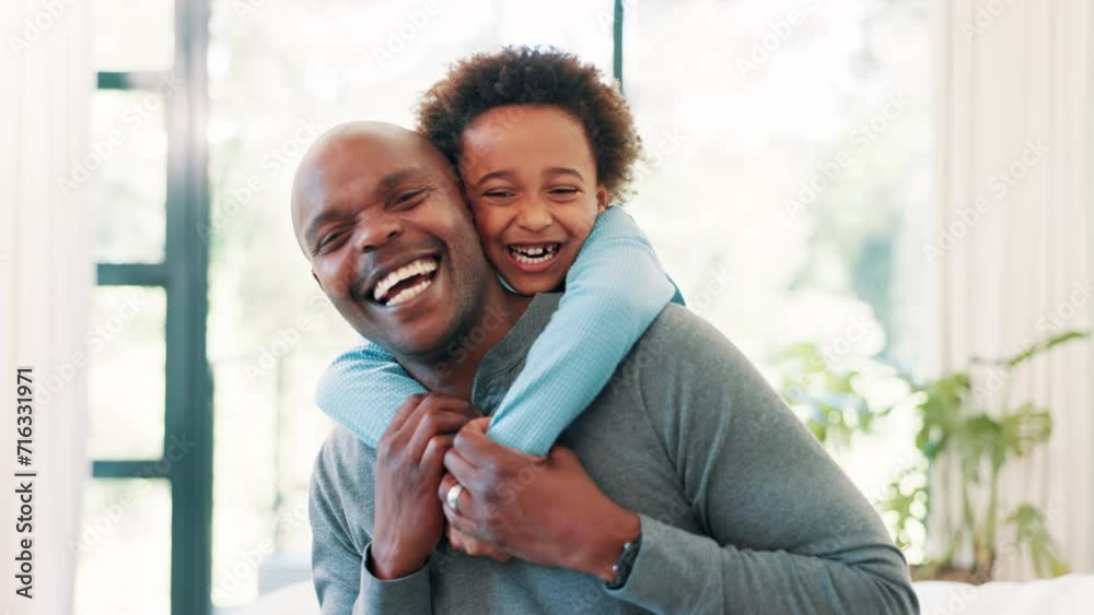 Laughing, face or father with a happy child to hug in home for care, safety or love together to relax. Smile, African or single parent dad with fun kid for support, trust or comfort in a black family Laughing, face or father with a happy child to hug in home for care, safety or love together to relax. Smile, African or single parent dad with fun kid for support, trust or comfort in a black family