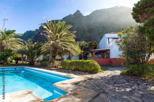  view of swimming pool by sea against sky (La Palma, Canary Islands, Spain) photo