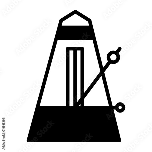 Metronome solid glyph icon