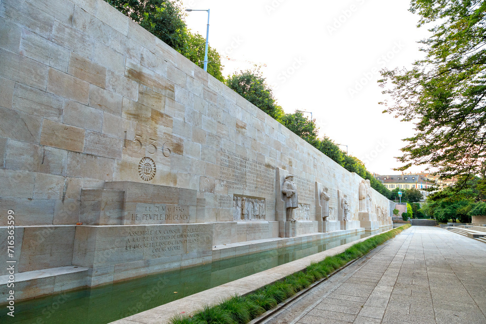 Geneva, Switzerland - July 13, 2019: International Monument to the Reformation. Commonly known as: Mur des Reformateurs - Reformatiion Wall - obrazy, fototapety, plakaty 