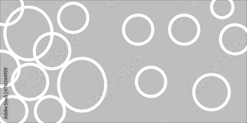 Abstract illustration of randomly arranged white rings with soft shadows on gray background Gray and white geometric monochrome seamless and white geometric monochrome seamless pattern .